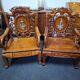 Pair of Asian armchairs in carved wood with mother-of-pearl inlays.
