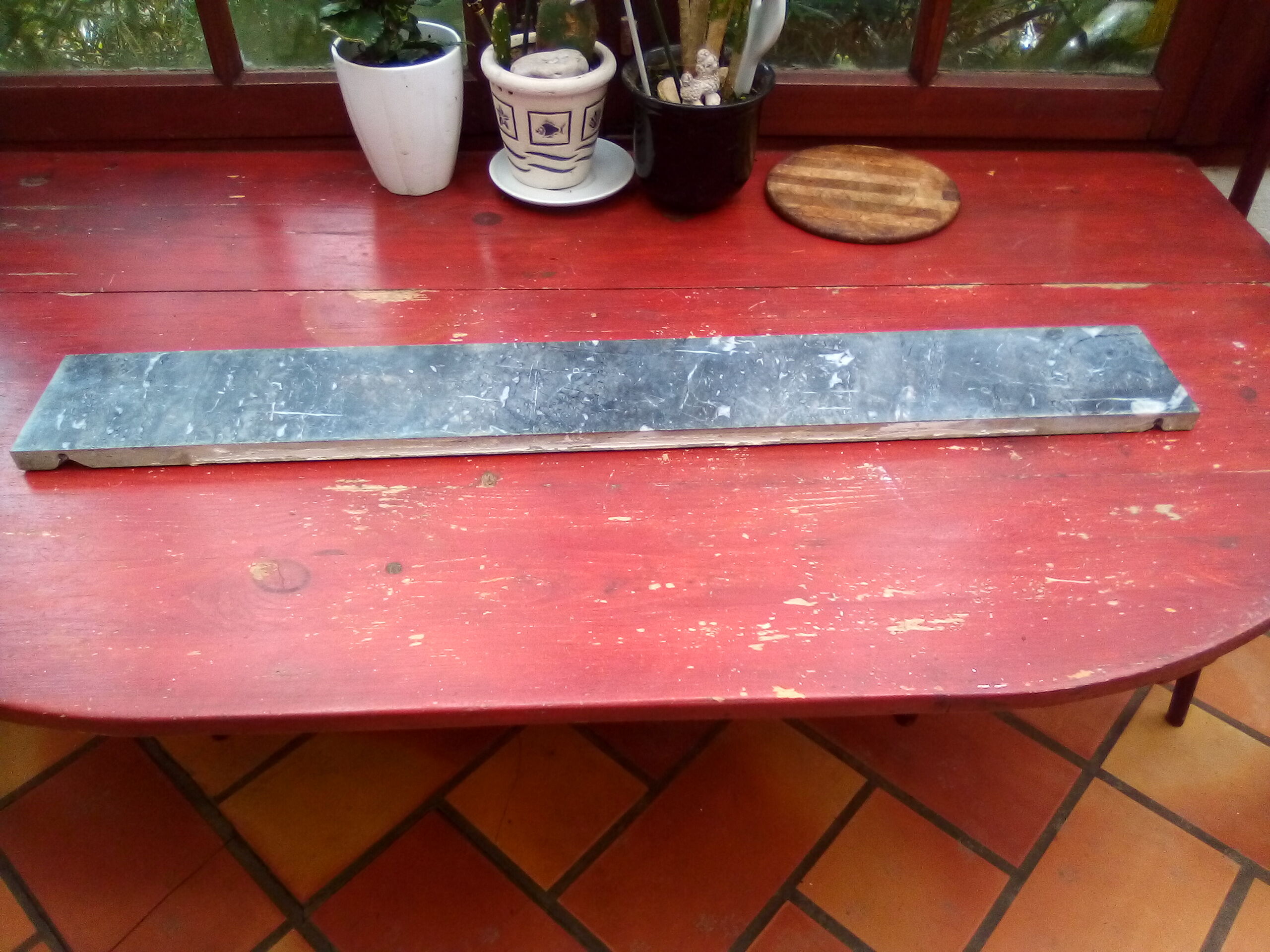 White veined black marble fireplace