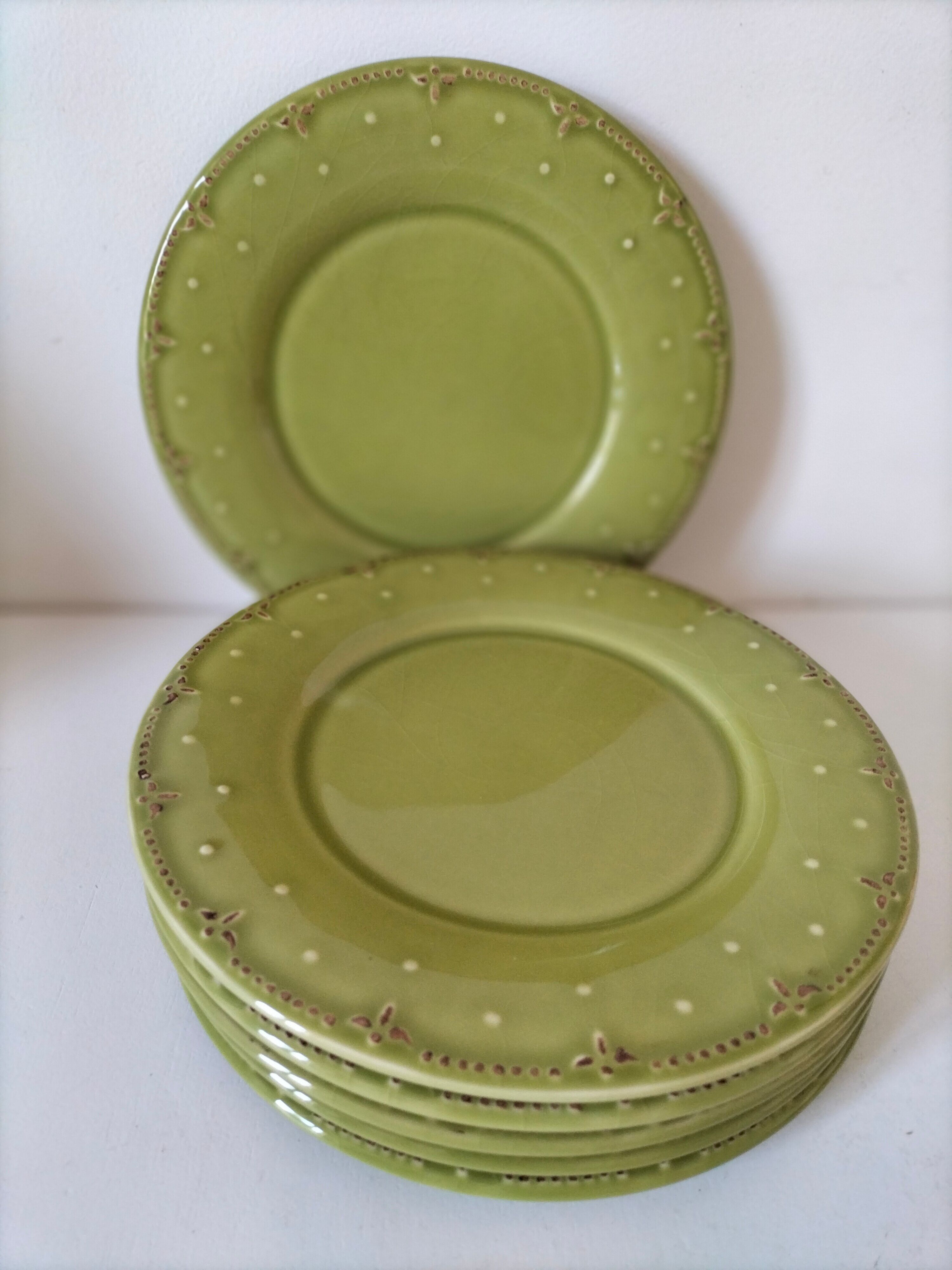 6 olive green plates with dotted relief, workshop ceramic style
