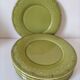 6 olive green plates with dotted relief, workshop ceramic style