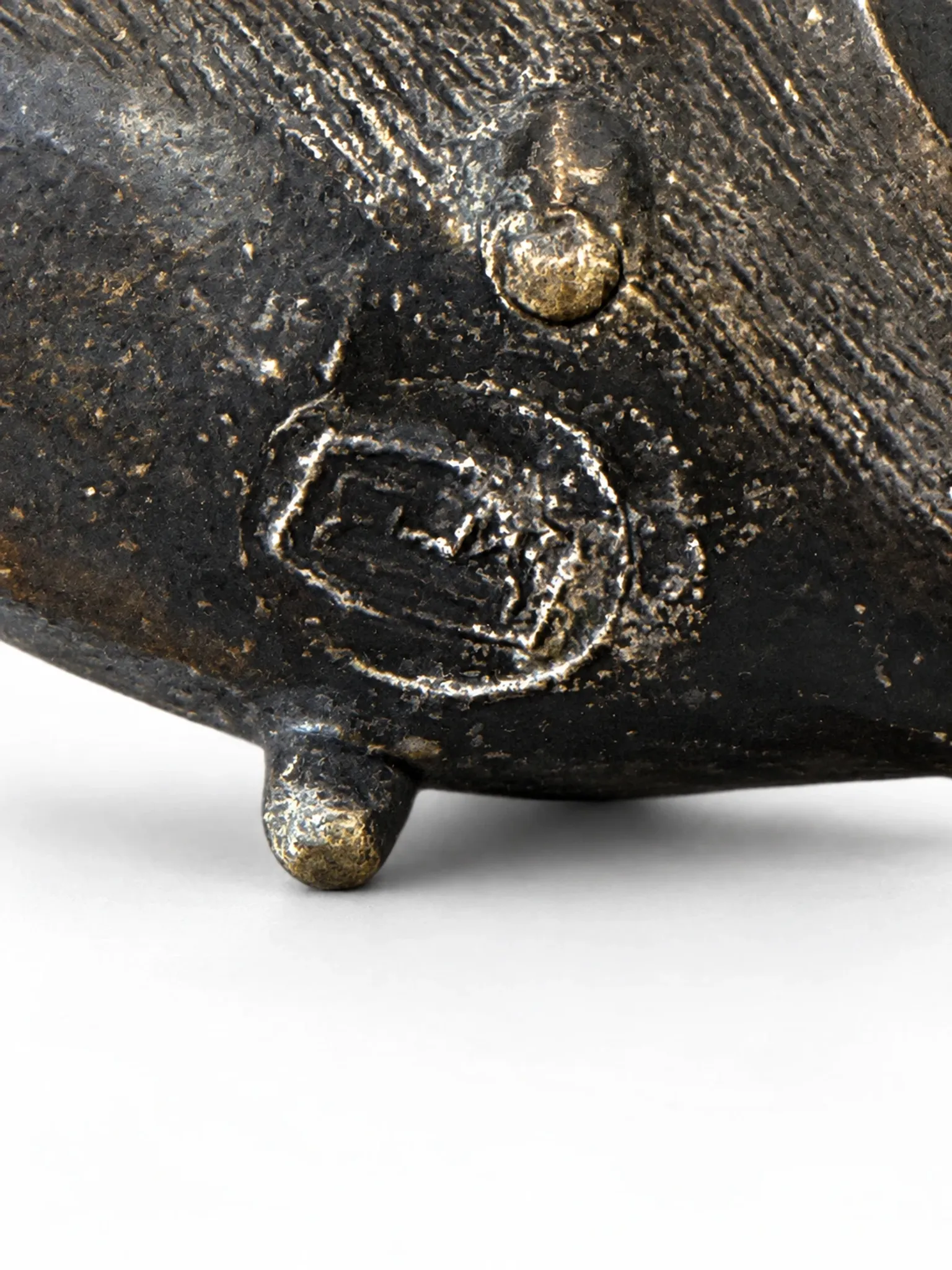 Nested hedgehogs in patinated brass – Walter Bosse
