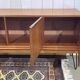 1970s English enfilade in teak with splayed legs.