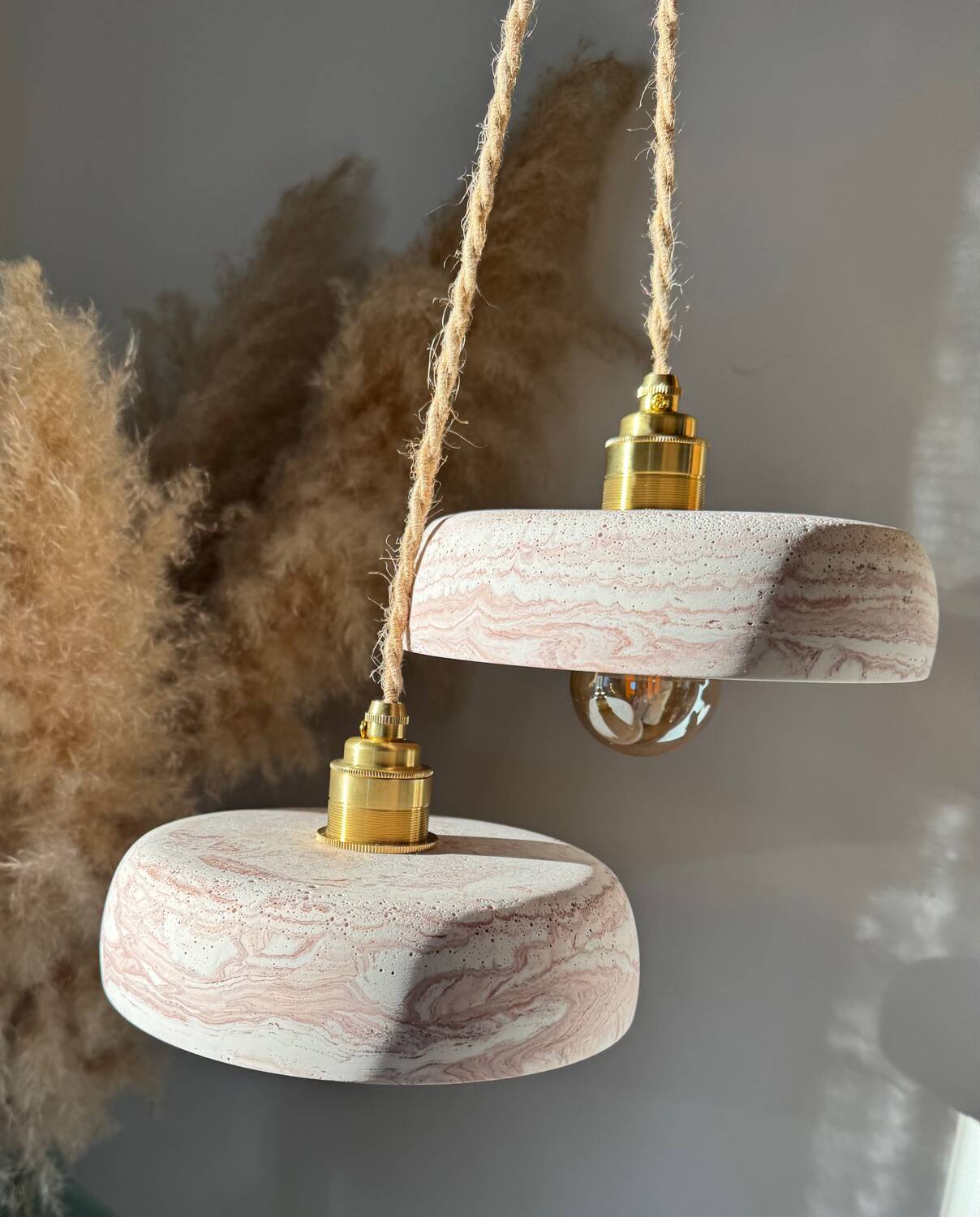 Pair of handcrafted portable lamps with a marbled stone effect