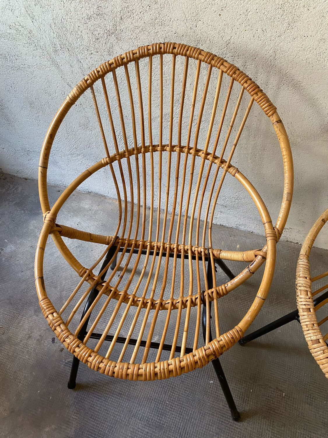 Two rattan armchairs