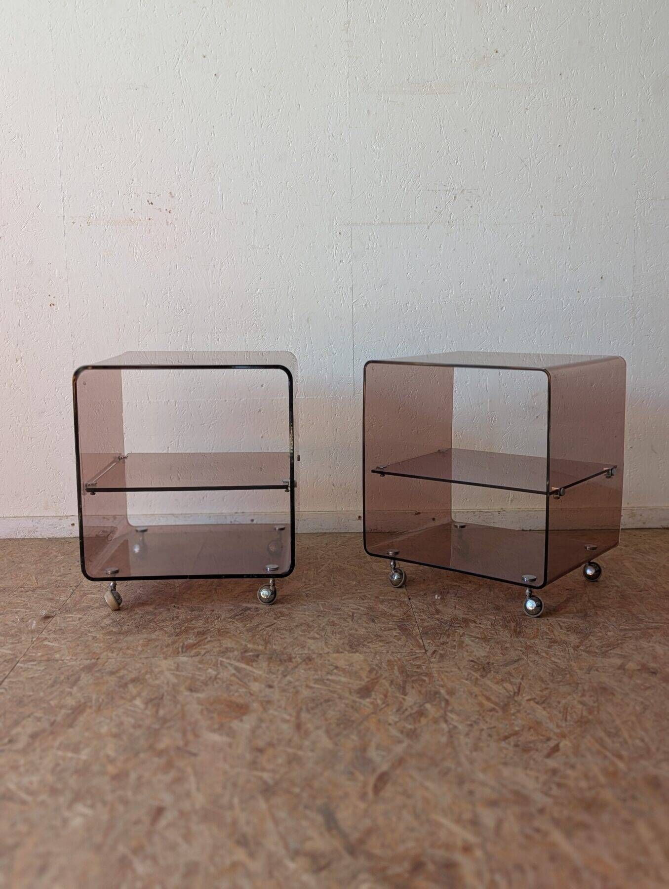 Pair of vintage smoked plexiglass bedside tables or accent furniture.