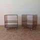 Pair of vintage smoked plexiglass bedside tables or accent furniture.