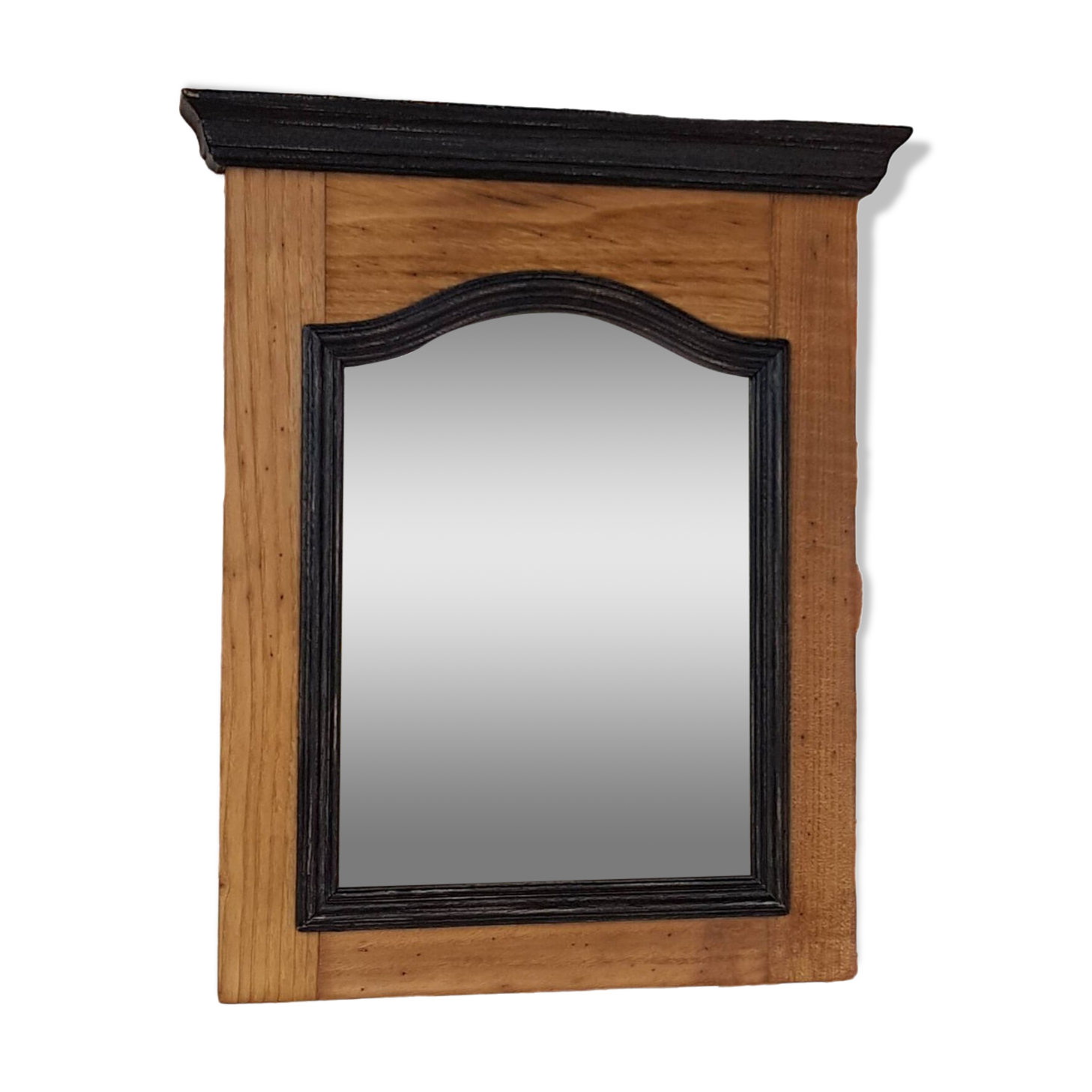 Black mirror and raw natural wood