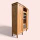 Asymmetrical Art Deco glass-fronted Parisian wardrobe in raw oak, 1930.