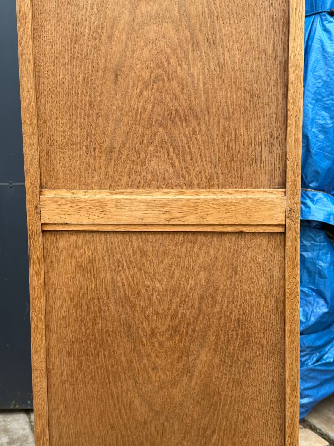 Parisian hotel wardrobe with bevelled mirror, solid raw oak, 1920.