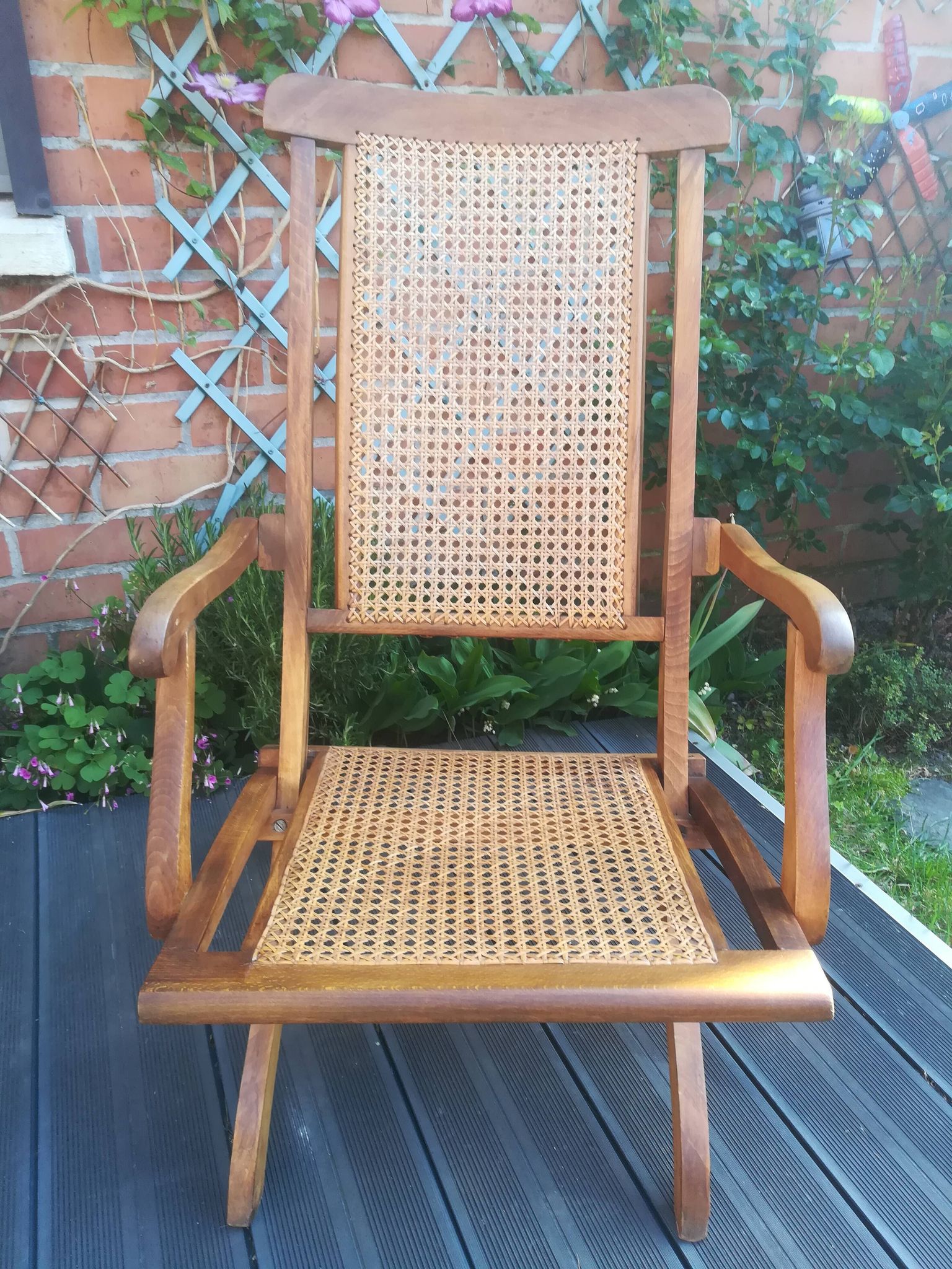 Folding beech cane armchair