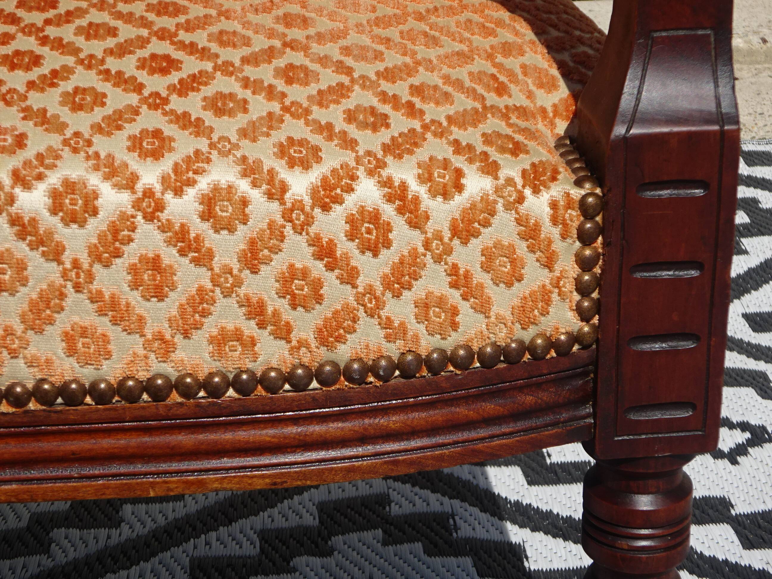 Vintage bench in wood and orange/ivory velvet.