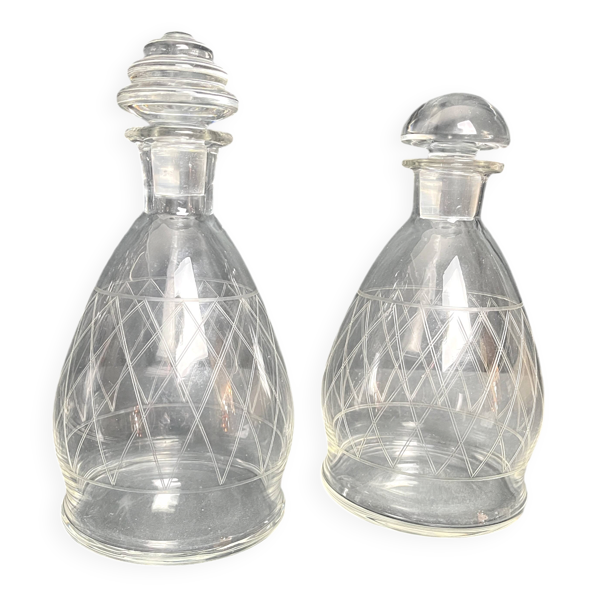 Tableware, two engraved crystal carafes with stoppers from around 1940.