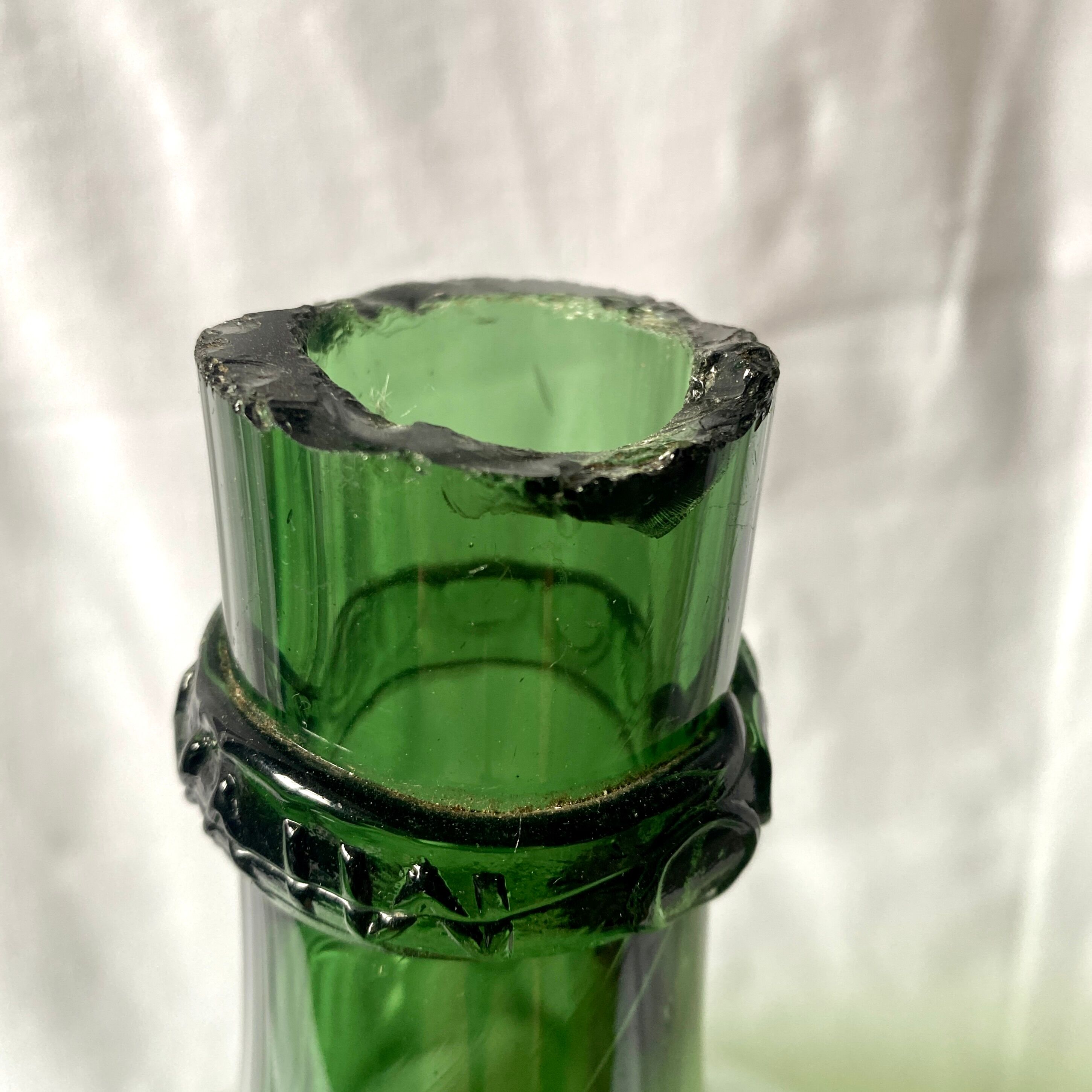 Old Lady Joan in green glass