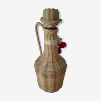 Vintage braided rattan bottle