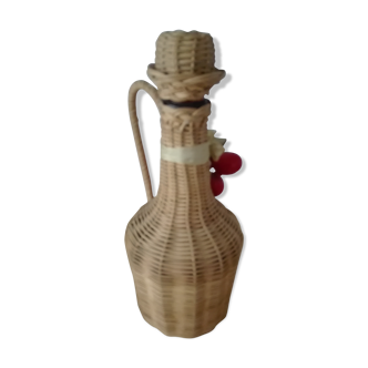 Vintage braided rattan bottle