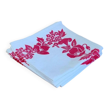 Set of 4 vintage white table napkins with pink flowers.
