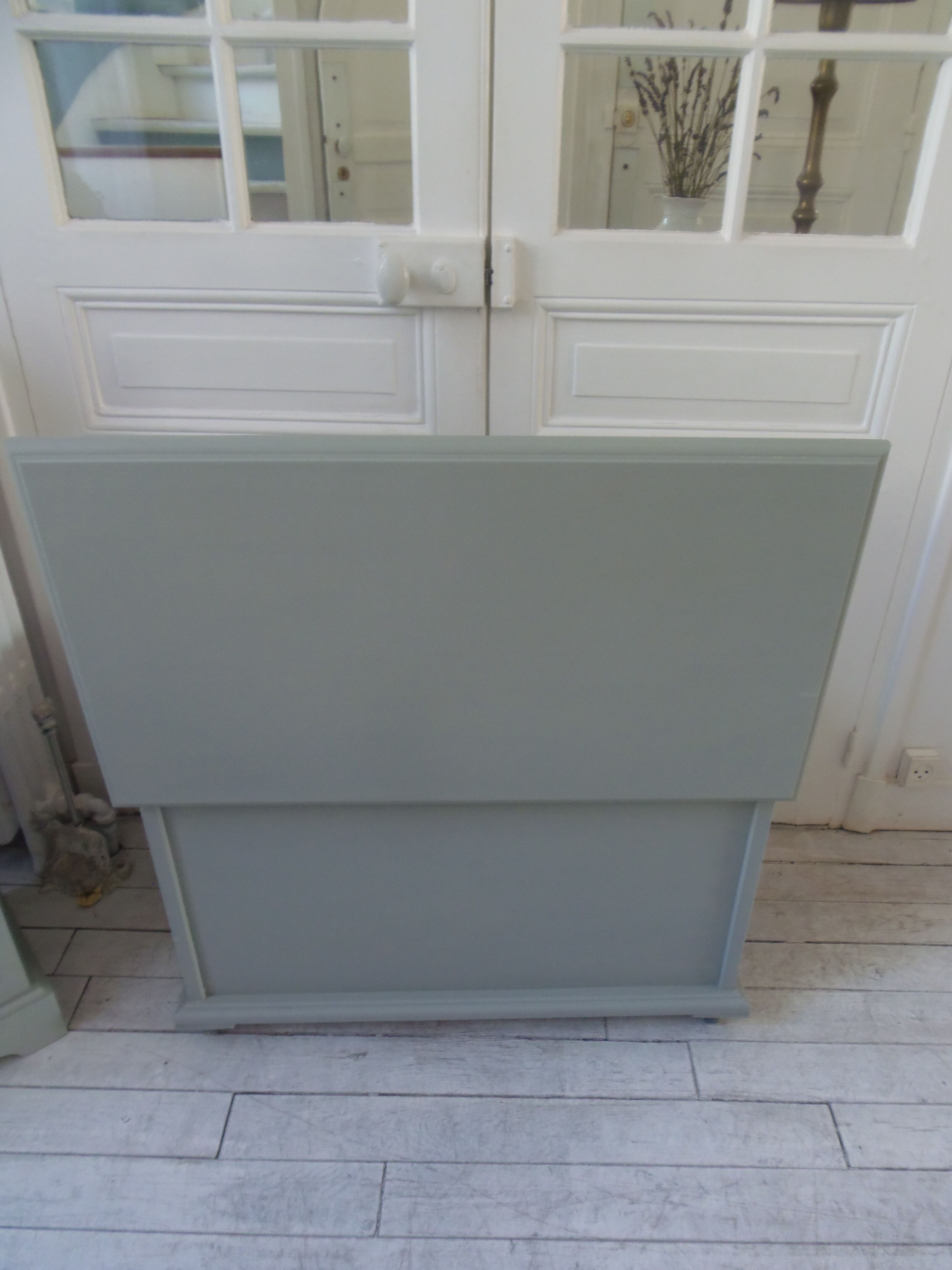 Toy chest on wheels patinated green of gray