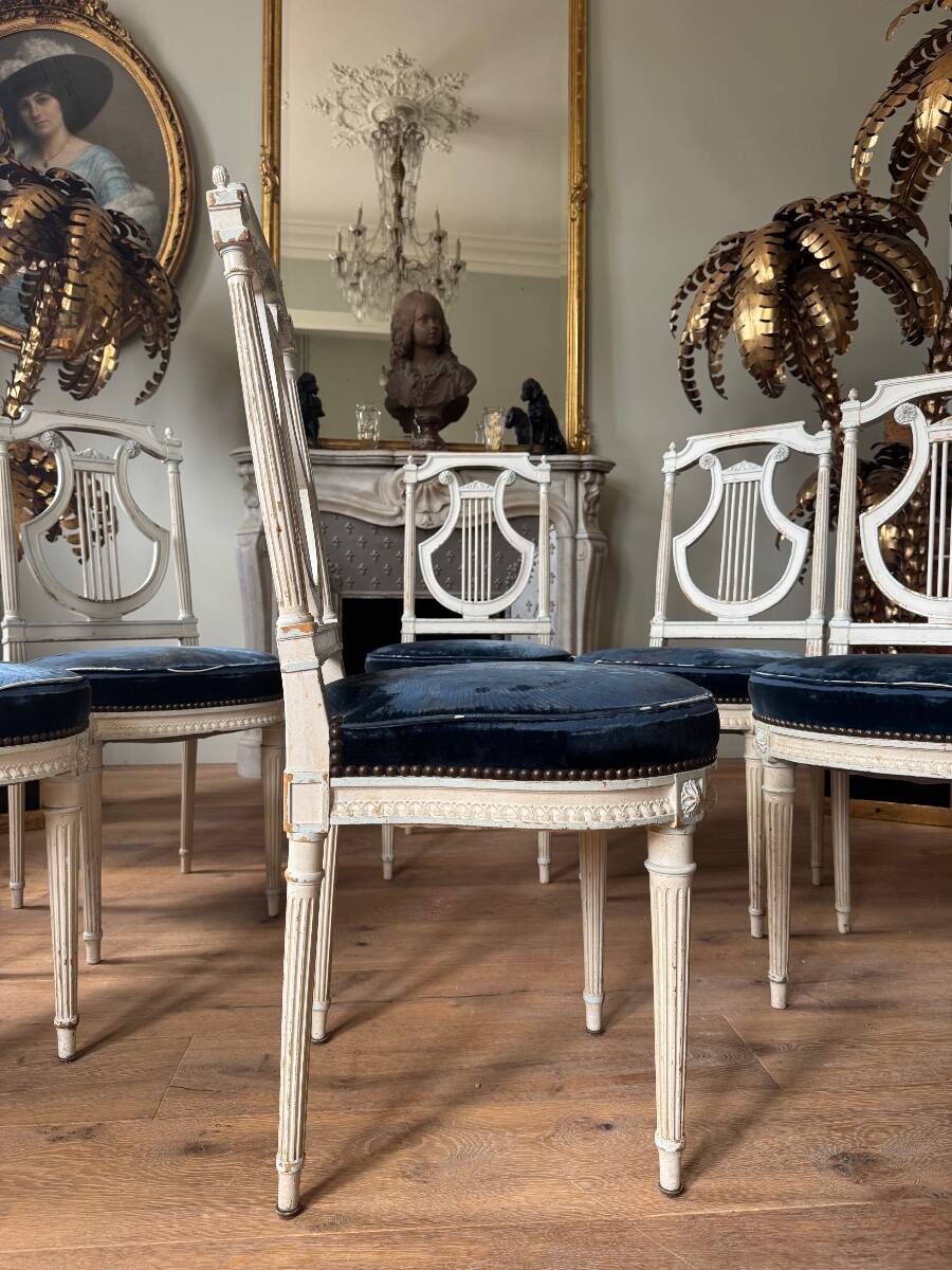 Set of 6 lyre chairs from the Napoleonic III period in painted wood in the Louis XVI style.