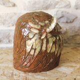 Enamelled terracotta head signed