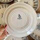 Set of 8 vintage iron earthenware flat plates, Annam de Gien model
