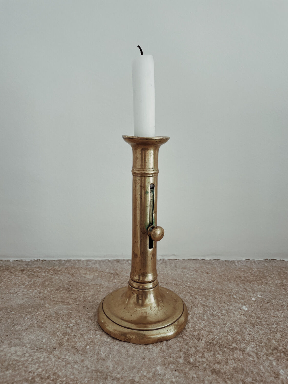 Antique brass candle holder