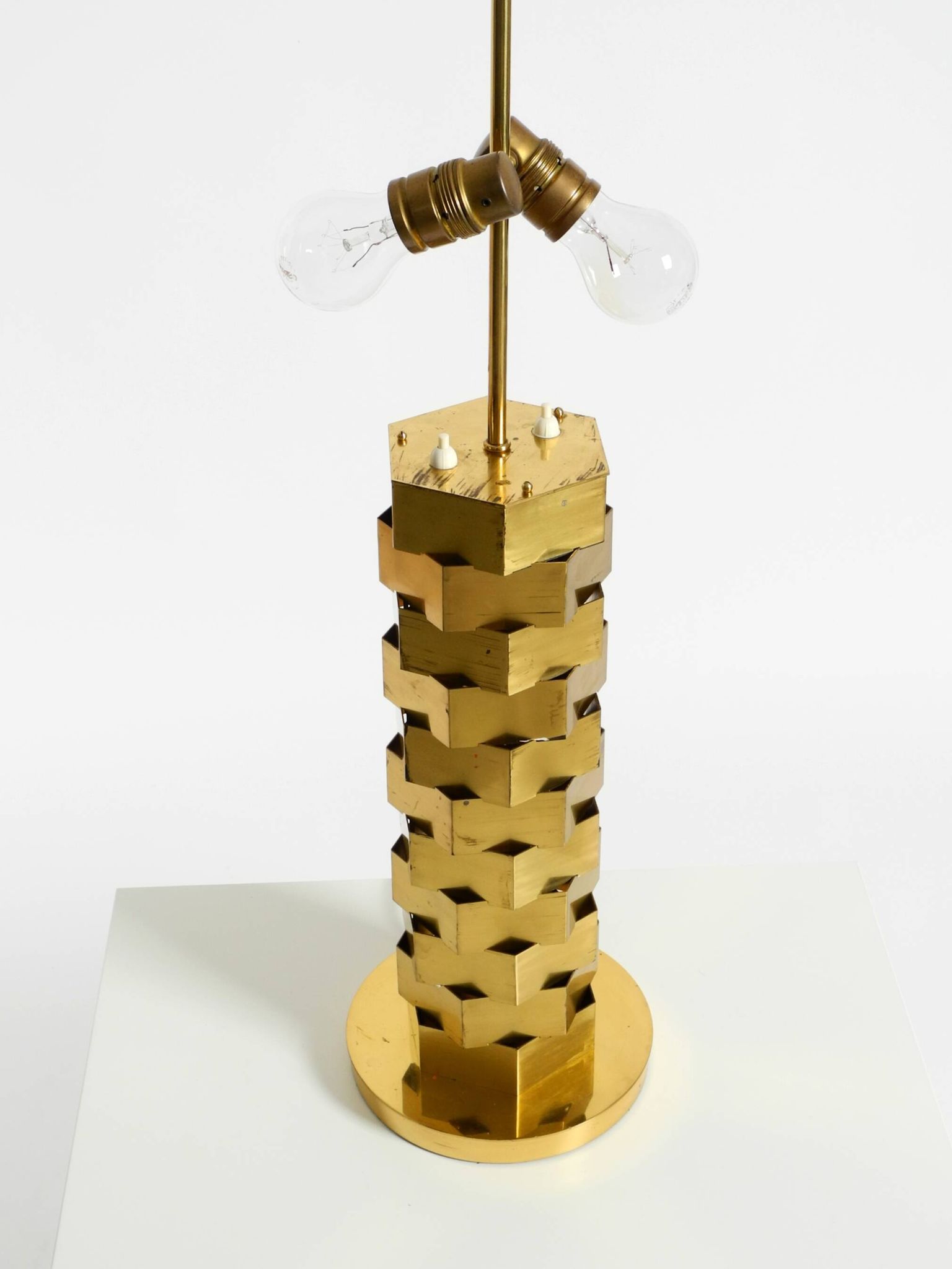 1960s brass table lamp by Vereinigte Werkstätten with an illuminated base