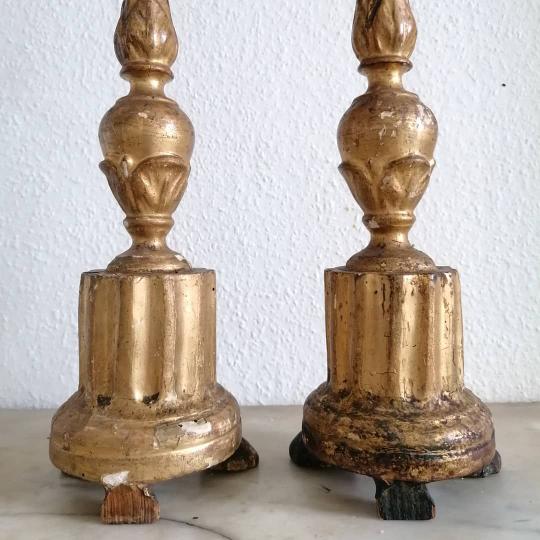Pair of gold candlesticks with leaf