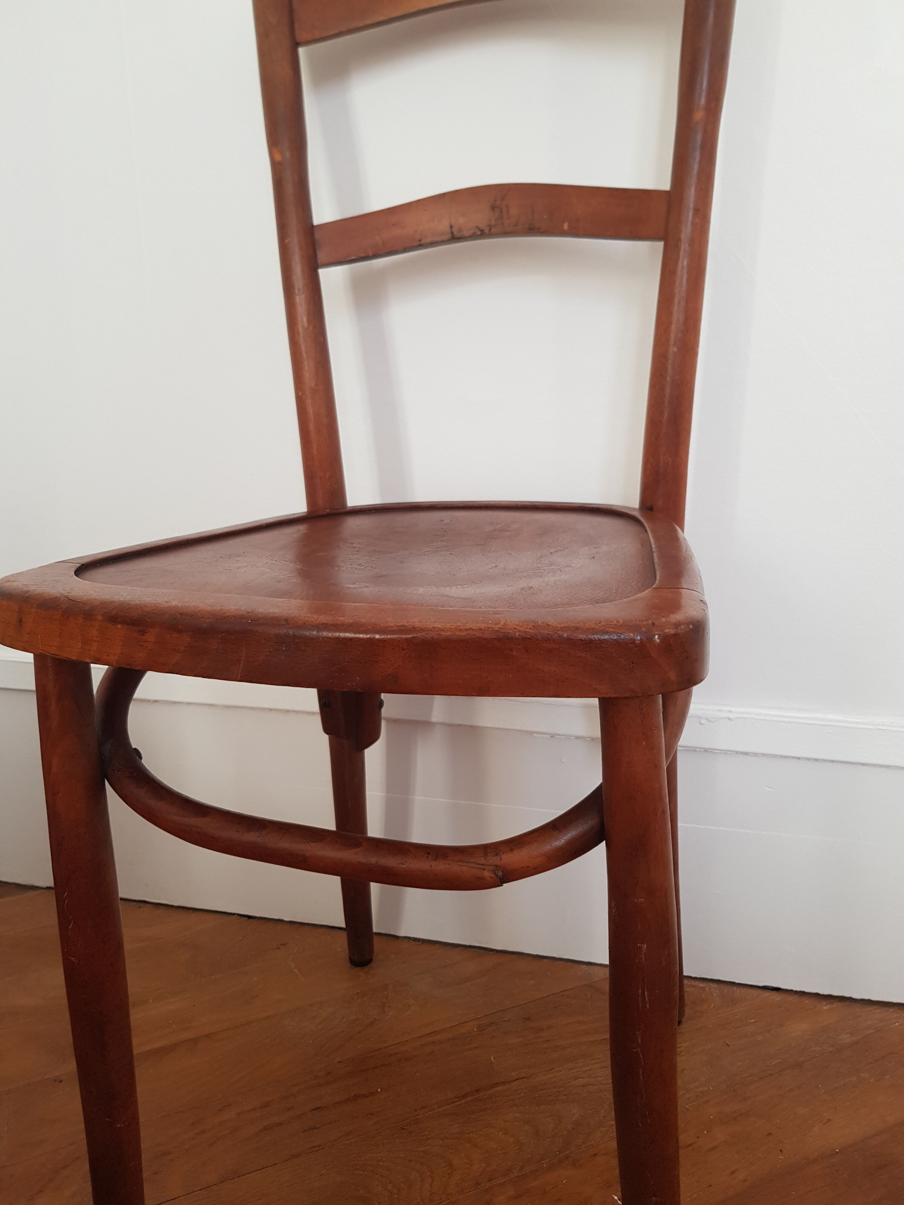 Curved wooden bistro chair