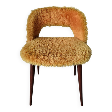 Authentic old vintage furry armchair in good condition