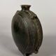 Nomadic rider's jug in green glazed earthenware, China, Tang Dynasty.