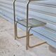 End table in gold metal and smoked glass