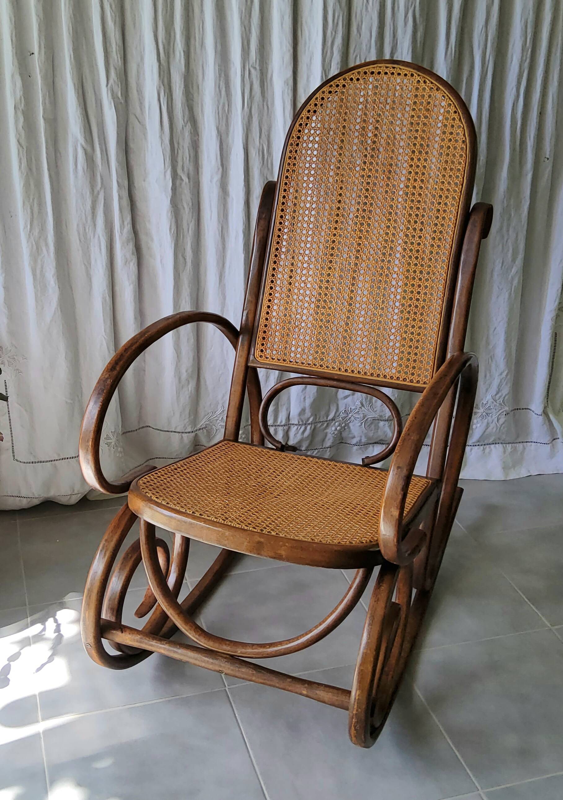 Antique caned rocking chair