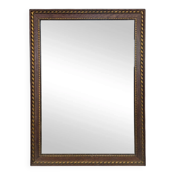 Rectangular wooden mirror with twisted gold fillet.