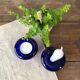 Duo de bougeoirs vintage en verre bleu