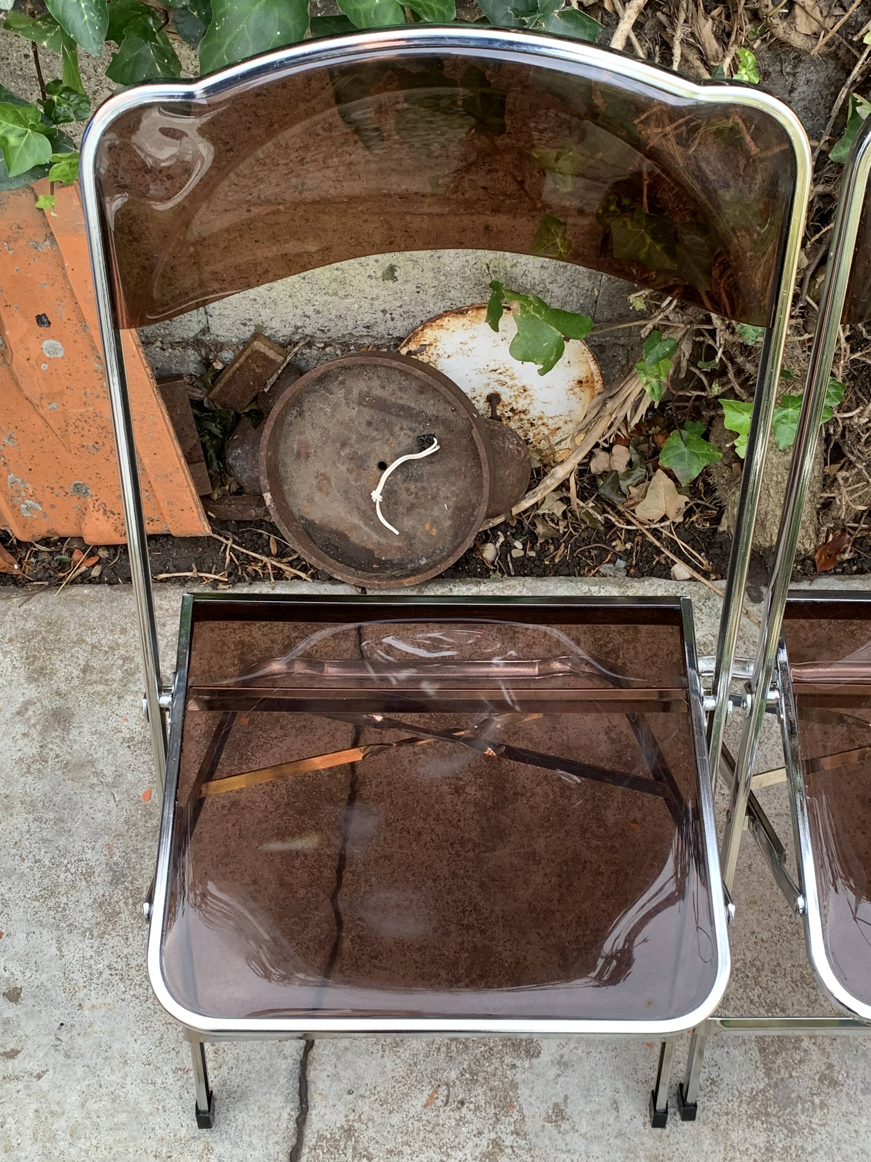 6 chaises pliantes en Plexiglas fumé et métal chrome Chaisor 1970