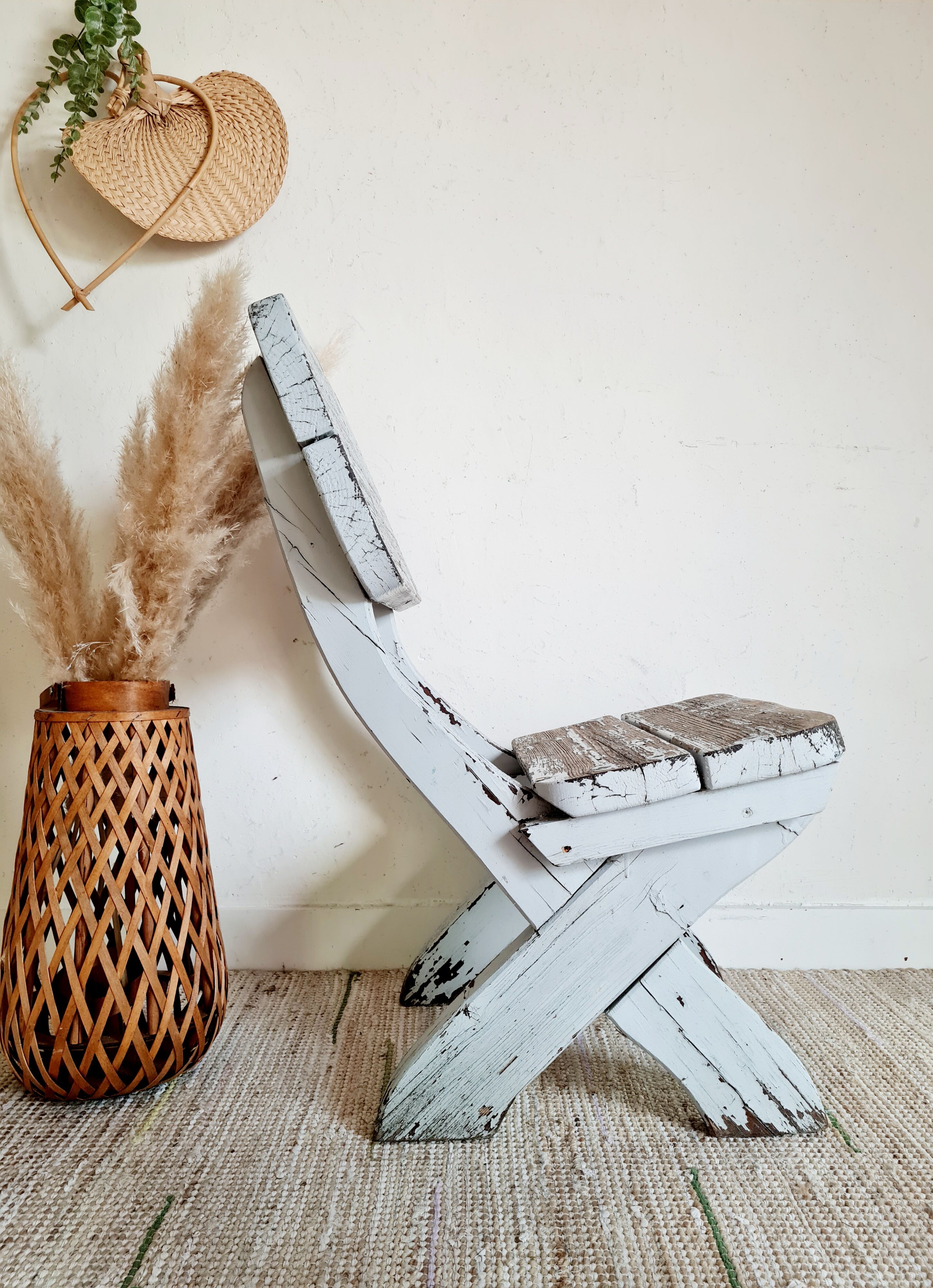 Patinated white old garden chair