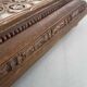 Vintage wooden and antique earthenware trivet, brown tile design