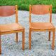 Pair of brutalist chairs in elm and stretched leather with saddle stitching Self publisher