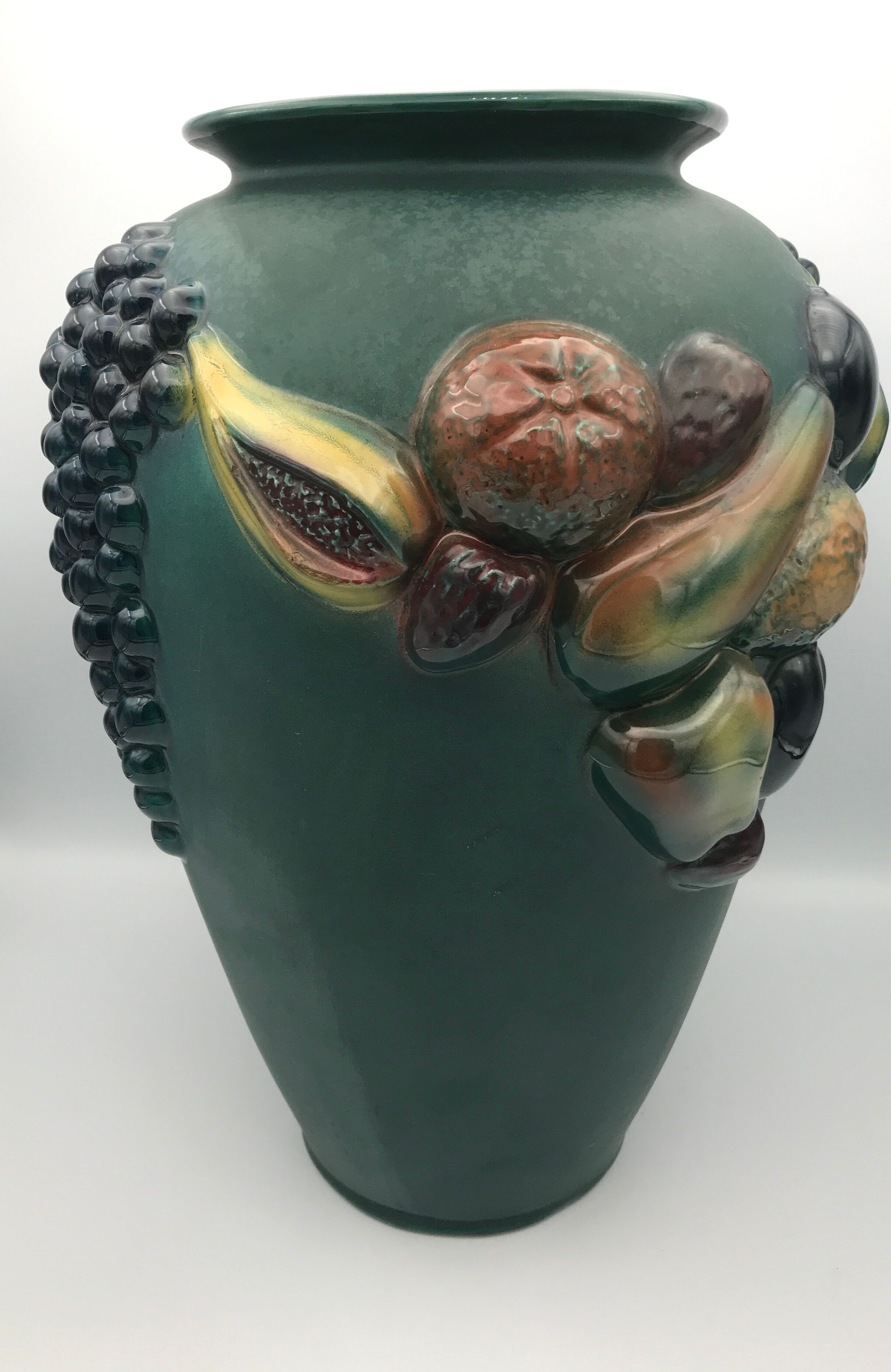 Green ceramic vase with polychrome decoration of fruits and vegetables in relief 33.5 cm