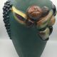 Green ceramic vase with polychrome decoration of fruits and vegetables in relief 33.5 cm