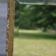 Large bevelled khaki mirror in mother-of-pearl from the 70s/80s.