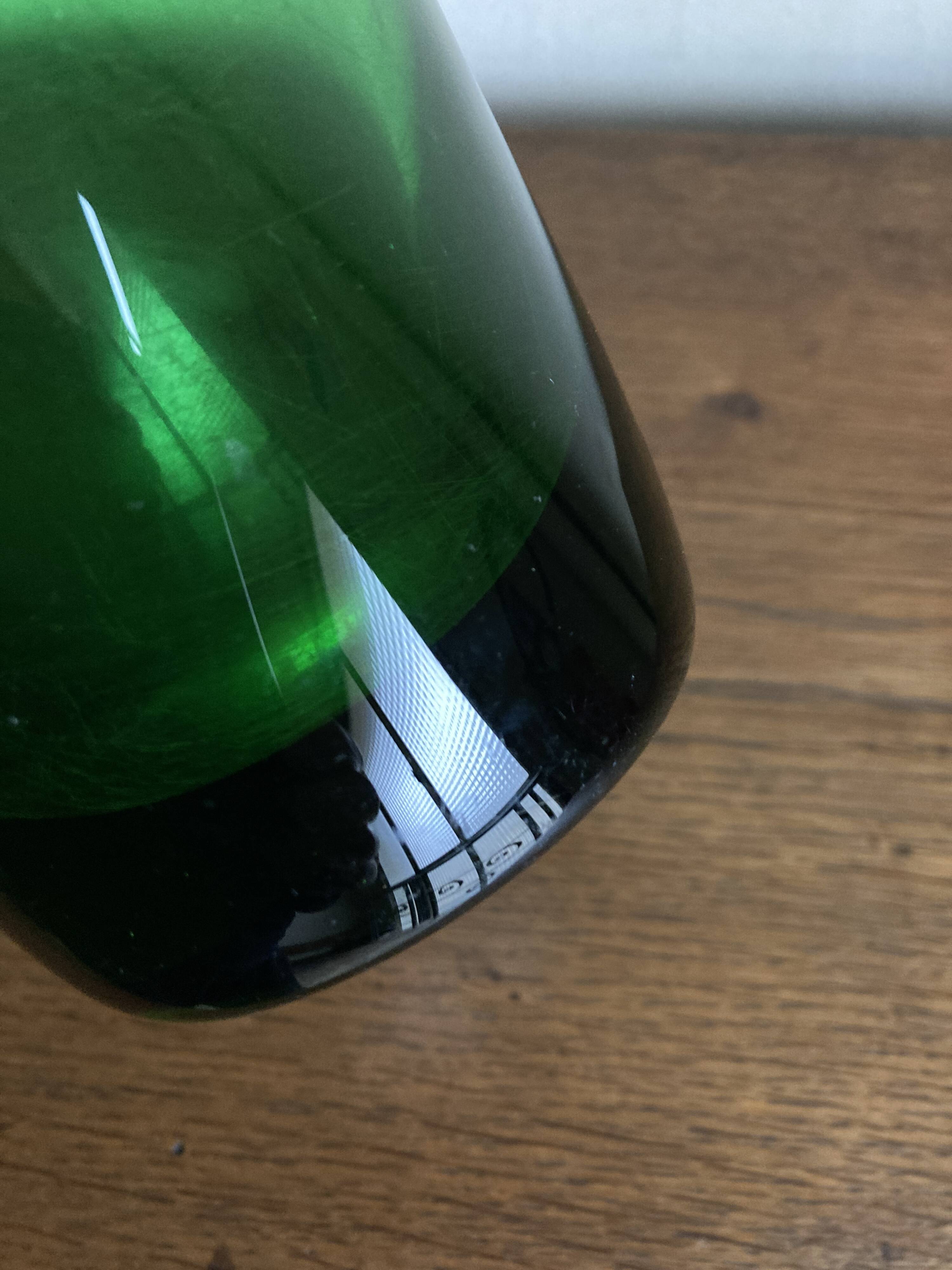 1950s Médicis vase, large Art Deco with handles, made of green blown glass.