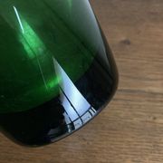 1950s Médicis vase, large Art Deco with handles, made of green blown glass.