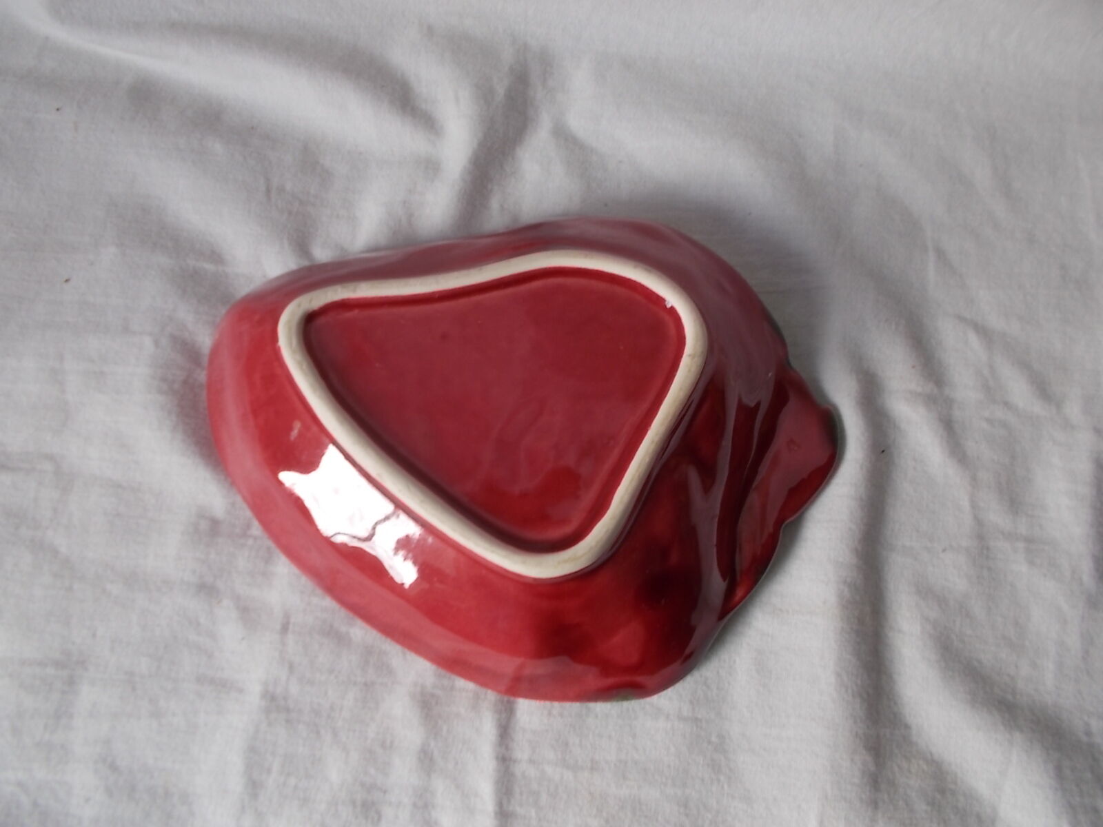 Strawberry-shaped dish in dabbling