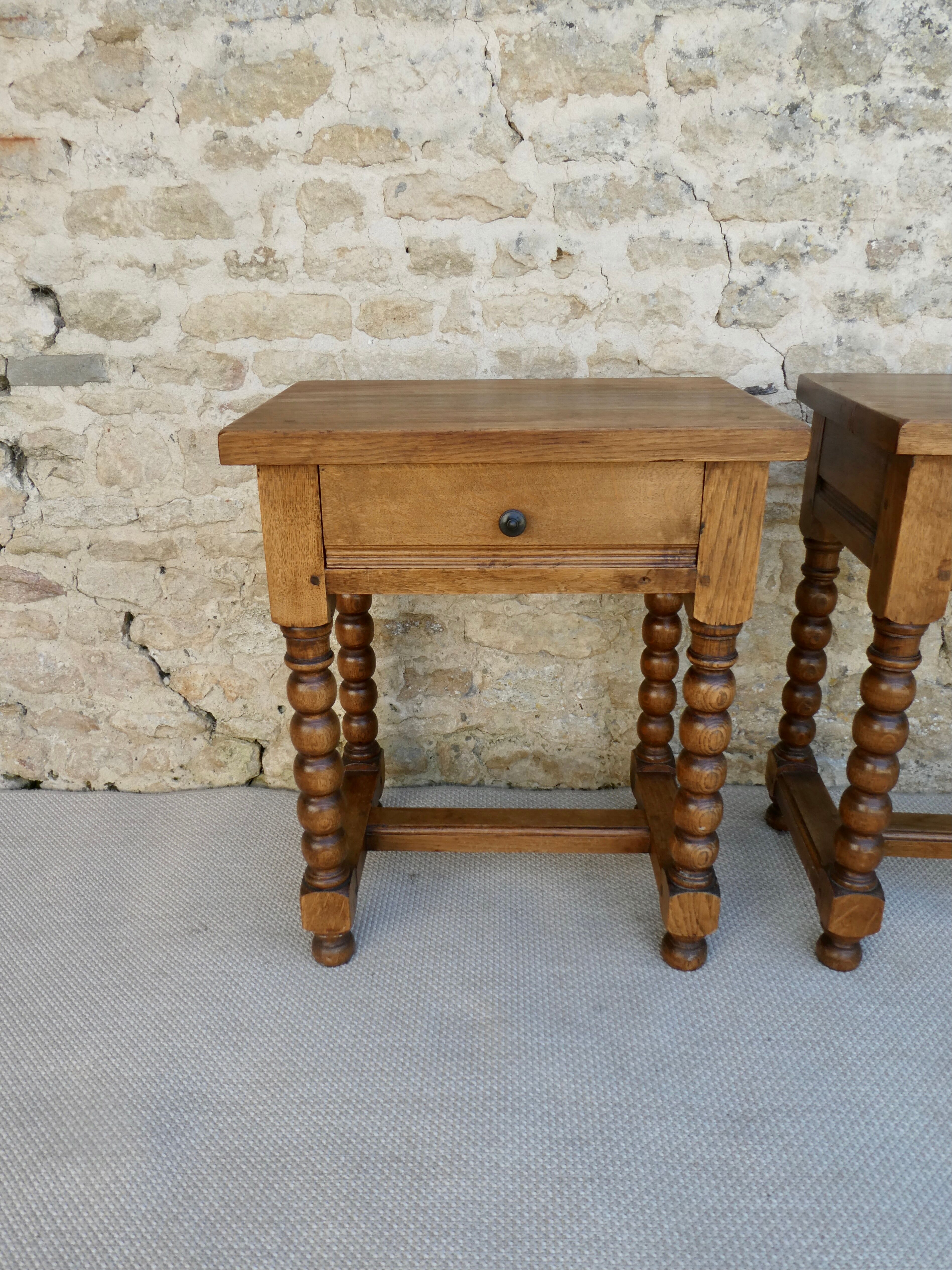 Pair of solid oak bedside tables with carved legs