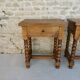 Pair of solid oak bedside tables with carved legs