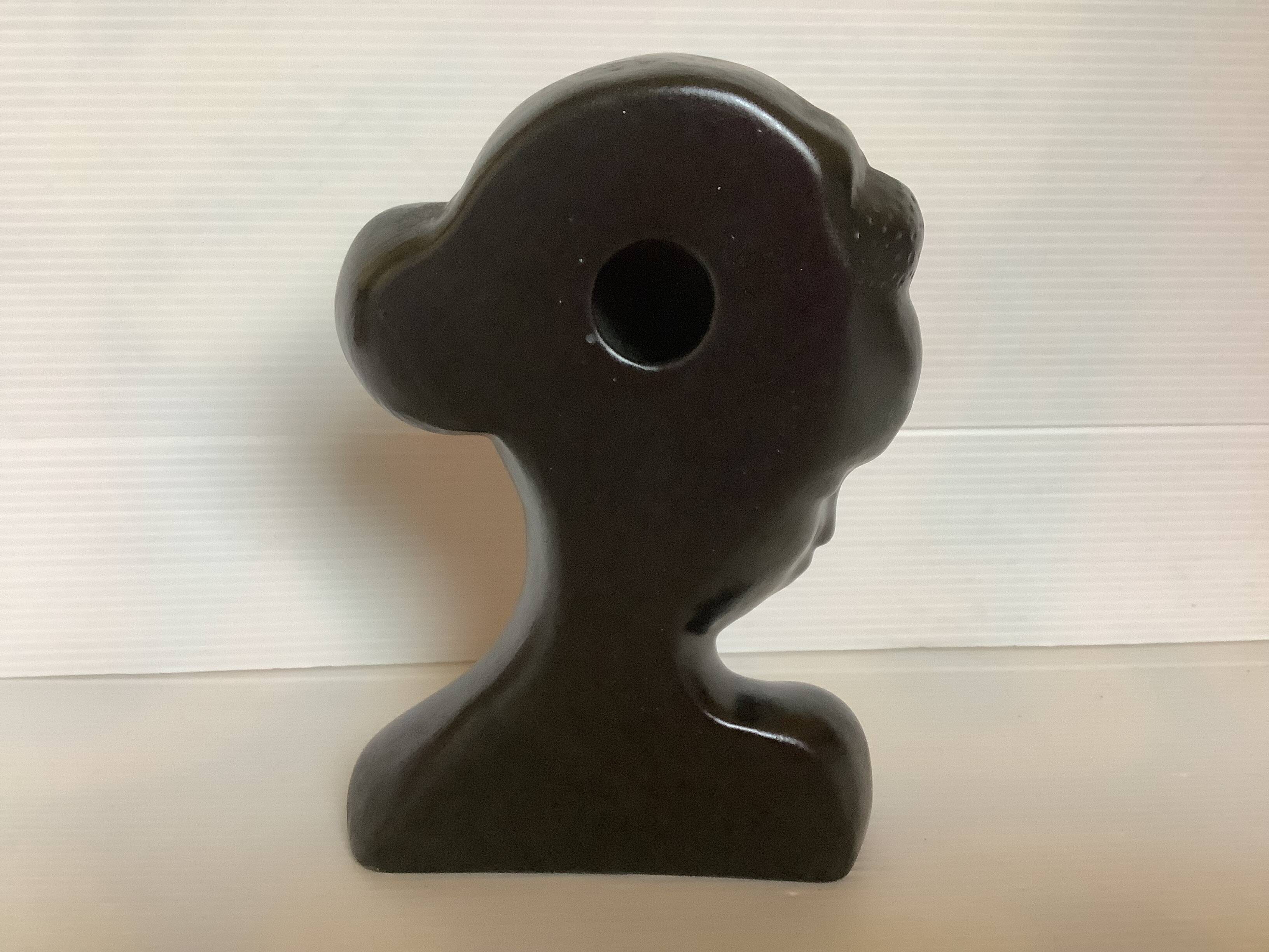 Antique bust of an African woman to stand or hang