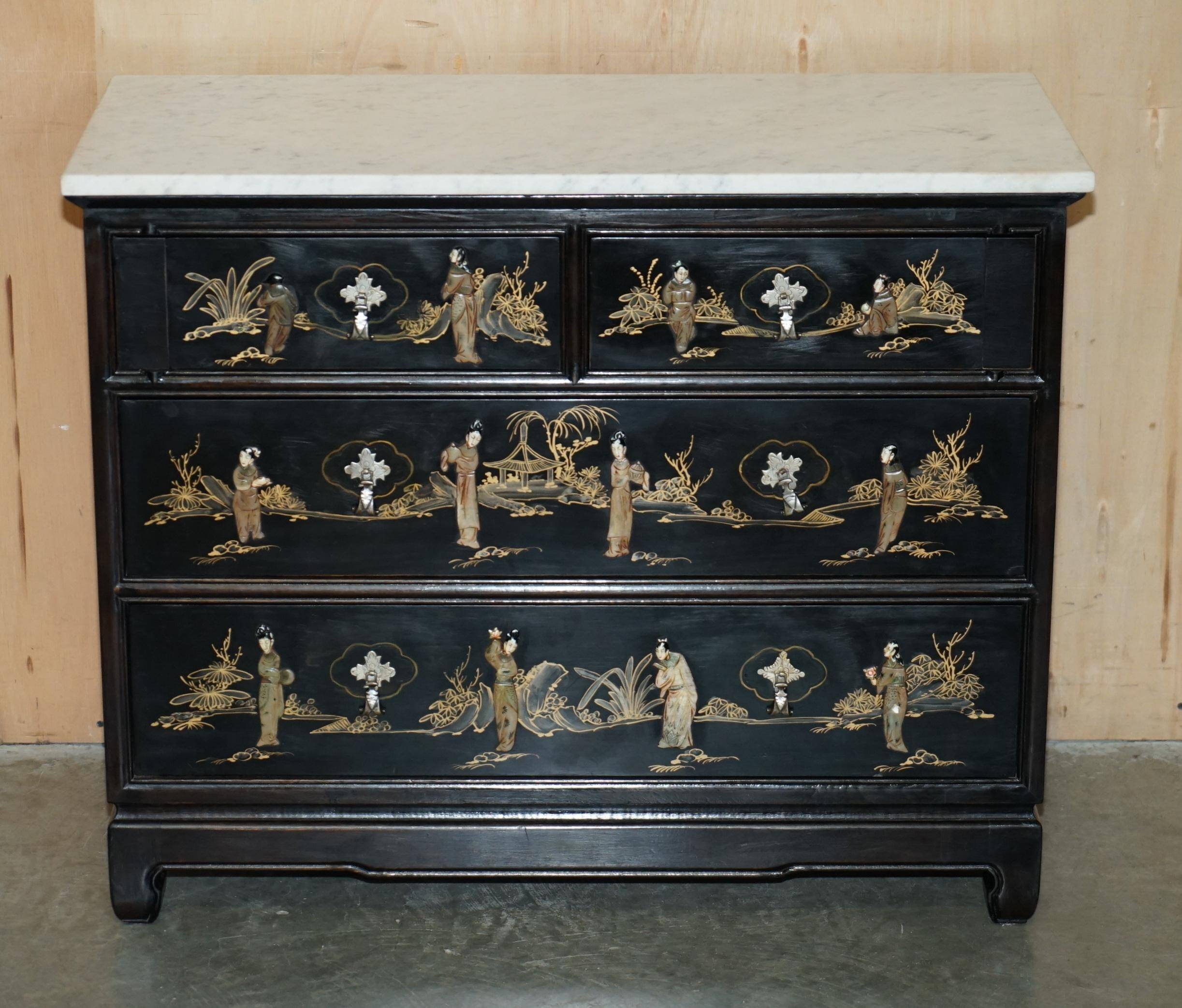 Antique Chinese commode carved in steatite with a marble top.