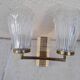 Pair of vintage wall lights from the 50s and 60s in brass glass
