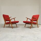 Pair of armchairs in mottled red and wood by Uluv, former Czechoslovakia 1960